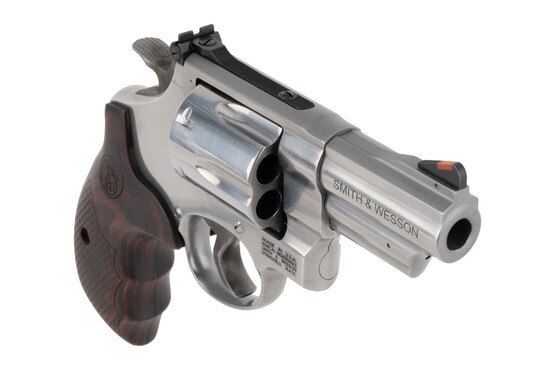 S&W 629 Deluxe 44 Magnum 6 Round Revolver features a 3 inch barrel, stainless steel frame, and textured wooden grips for a traditional styled design.